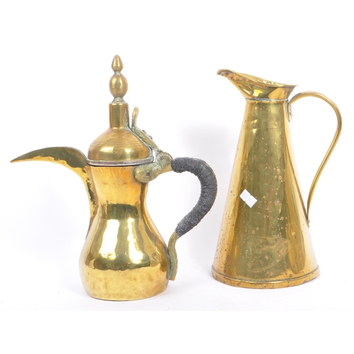 234 - A collection of brass items to include a Turkish / Islamic brass Dallah - coffee / teapot. Hourglass... 