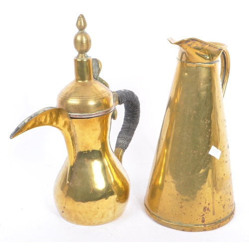 234 - A collection of brass items to include a Turkish / Islamic brass Dallah - coffee / teapot. Hourglass... 