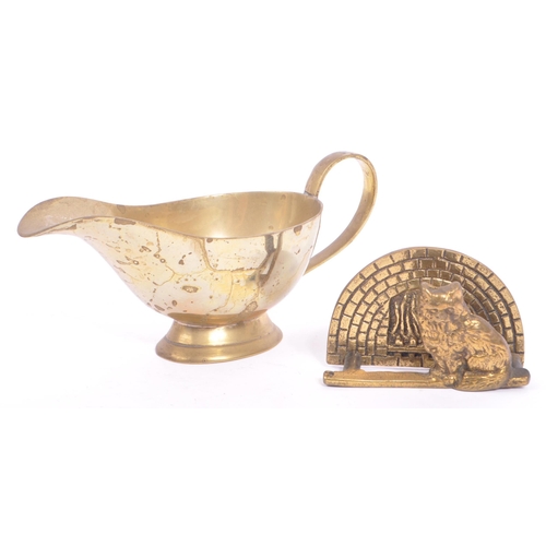 234 - A collection of brass items to include a Turkish / Islamic brass Dallah - coffee / teapot. Hourglass... 