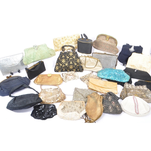 238 - A collection of approximately thirty decorative vintage 1930s and later handbags and purses. The lot... 