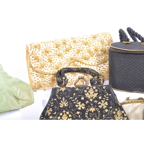 238 - A collection of approximately thirty decorative vintage 1930s and later handbags and purses. The lot... 