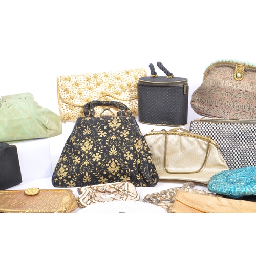 238 - A collection of approximately thirty decorative vintage 1930s and later handbags and purses. The lot... 