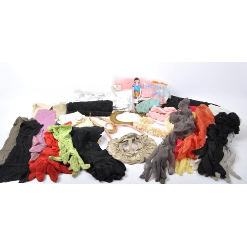 240 - A collection of vintage 20th Century gloves and other accessories. To include suede, nylon, silk and... 