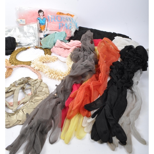 240 - A collection of vintage 20th Century gloves and other accessories. To include suede, nylon, silk and... 