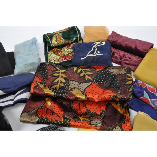 242 - A large collection of vintage 20th Century scarves to include silk, velvet and acetate fabrics in va... 