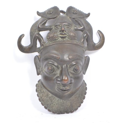 244 - A 20th century North African Cameroon bronze mask - Tikun/Bamun people. Having twin reptiles / chame... 