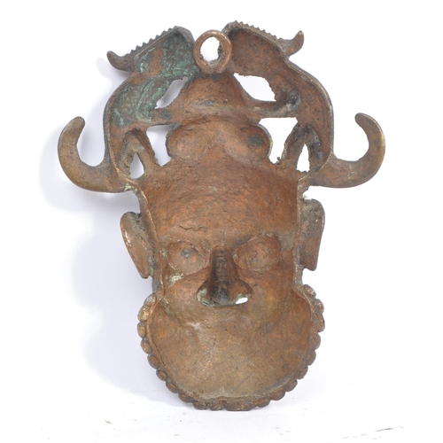 244 - A 20th century North African Cameroon bronze mask - Tikun/Bamun people. Having twin reptiles / chame... 