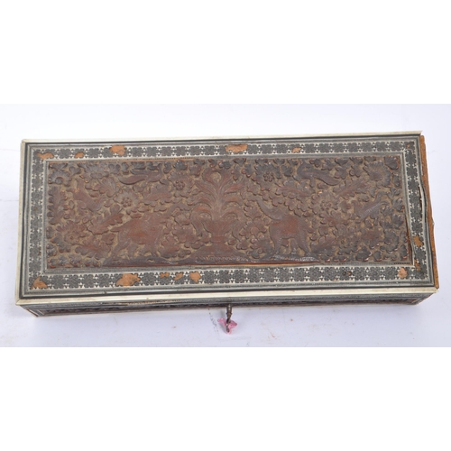 251 - A pair of 19th century games boxes of wooden construction. 
 Anglo Indian sandalwood box featuring c... 