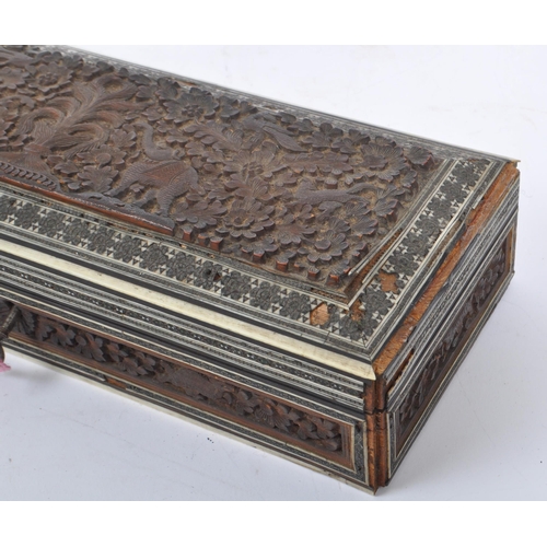 251 - A pair of 19th century games boxes of wooden construction. 
 Anglo Indian sandalwood box featuring c... 