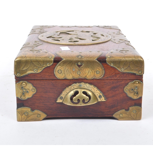 255 - A 20th century Chinese brass bound jewellery box alongside another lacquered example. The box having... 