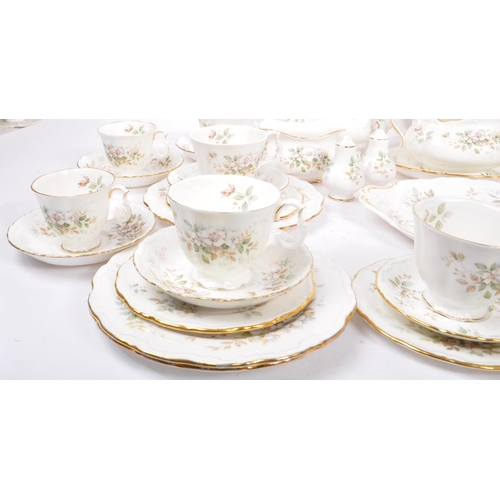 26 - A Royal Albert 'Hayworth' pattern porcelain dinner, tea and coffee service. To include teapot, cream... 