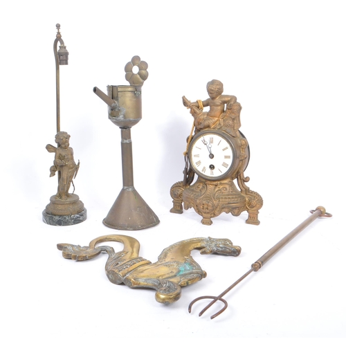 262 - A collection of assorted 20th century brass decorative items. The collection to include a cast brass... 