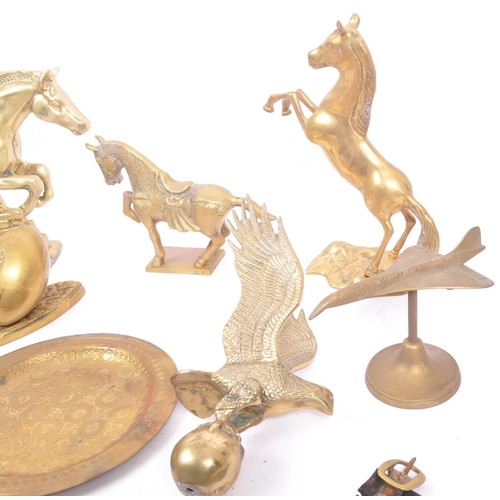 263 - A collection of assorted 20th century decorative brass items. The collection to include brass paperw... 