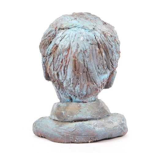 264 - A contemporary 'Wyn' fiberglass sculpture bust. The bust taking the form of an elderly lady, having ... 