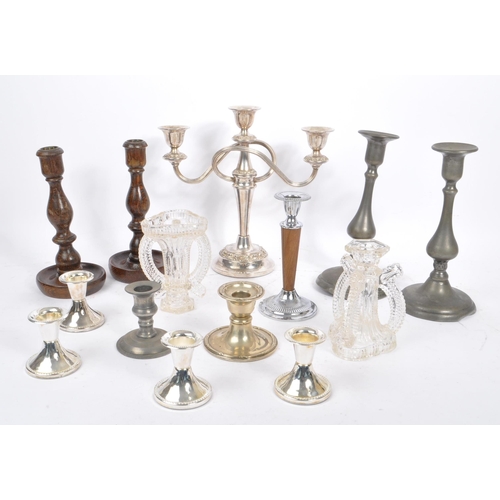 269 - A collection of 20th century candlesticks / candle holders. The collection to include two 1920s Art ... 