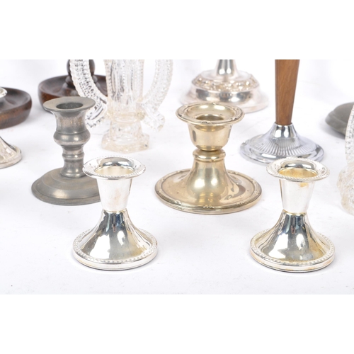 269 - A collection of 20th century candlesticks / candle holders. The collection to include two 1920s Art ... 