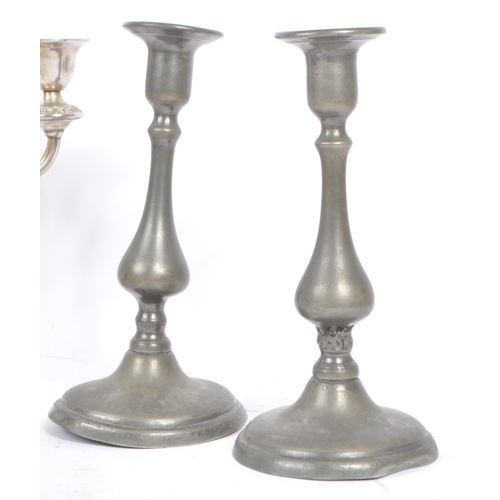 269 - A collection of 20th century candlesticks / candle holders. The collection to include two 1920s Art ... 