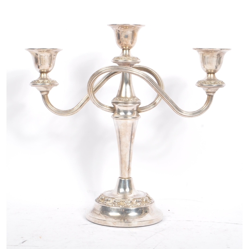 269 - A collection of 20th century candlesticks / candle holders. The collection to include two 1920s Art ... 