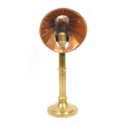 270 - A Victorian 19th Century copper and brass candle light student's lamp. Measures 39cm tall.