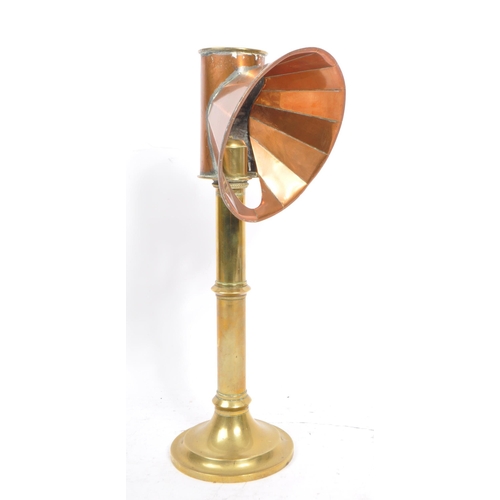 270 - A Victorian 19th Century copper and brass candle light student's lamp. Measures 39cm tall.