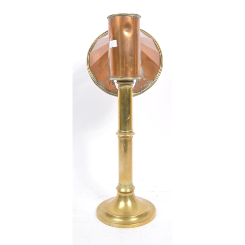 270 - A Victorian 19th Century copper and brass candle light student's lamp. Measures 39cm tall.