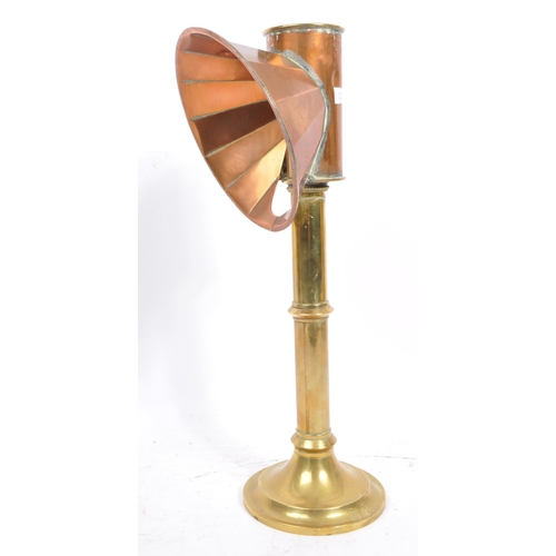 270 - A Victorian 19th Century copper and brass candle light student's lamp. Measures 39cm tall.