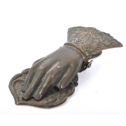 271 - A Victorian 19th century brass & tin paper note clip. In the form of a Art Nouveau style hand. Measu... 