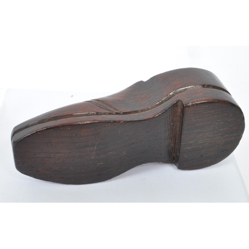 272 - A 19th century possibly Dutch apprentice piece wooden carved shoe. With shoe lace hole carved decora... 