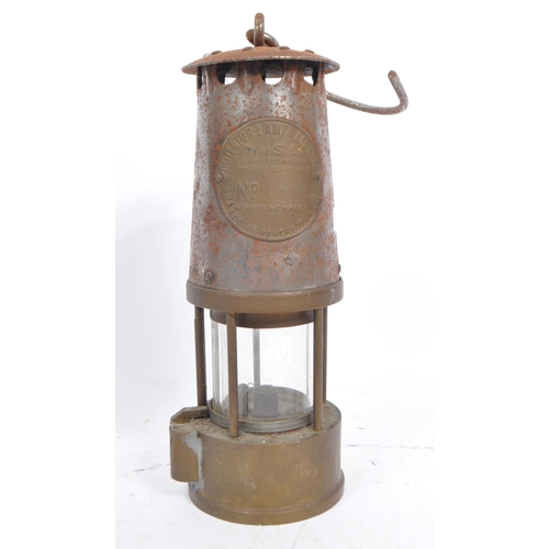 274 - A 20th century brass and metal miners lamp. Manufactured by The Protector Lamp & lighting Co Ltd. Sa... 