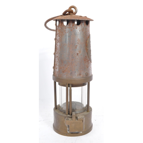 274 - A 20th century brass and metal miners lamp. Manufactured by The Protector Lamp & lighting Co Ltd. Sa... 