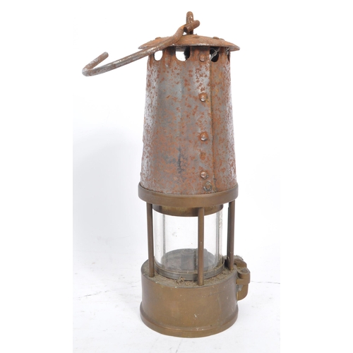 274 - A 20th century brass and metal miners lamp. Manufactured by The Protector Lamp & lighting Co Ltd. Sa... 