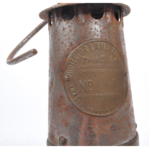 274 - A 20th century brass and metal miners lamp. Manufactured by The Protector Lamp & lighting Co Ltd. Sa... 