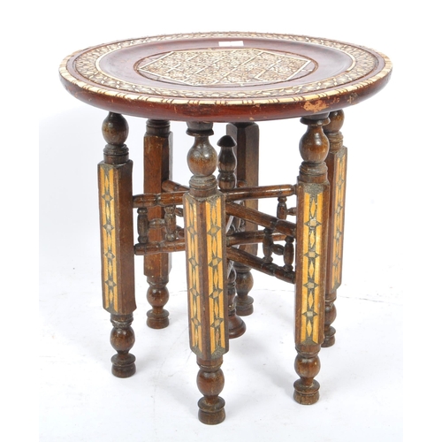 275 - A vintage 20th century small proportion Indian Benares table. Of painted wood construction, with bon... 