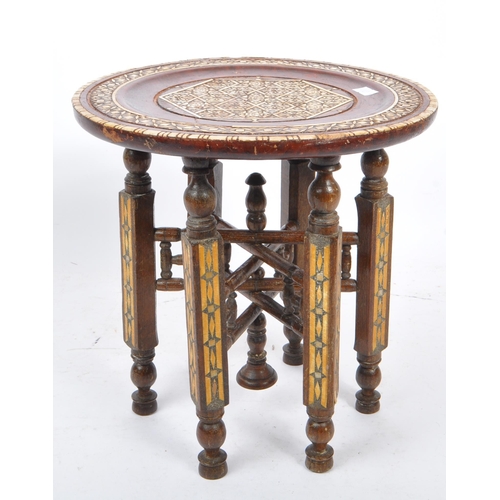 275 - A vintage 20th century small proportion Indian Benares table. Of painted wood construction, with bon... 