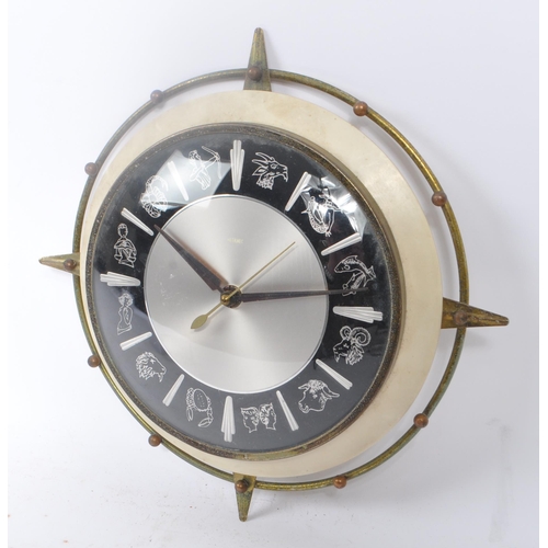 278 - Metamec - A vintage 20th century star sign horoscope wall clock. Of circular with metal wire work bo... 