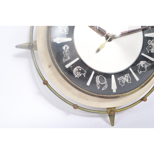 278 - Metamec - A vintage 20th century star sign horoscope wall clock. Of circular with metal wire work bo... 