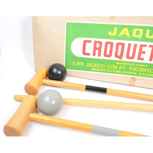 286 - A 20th Century vintage Jaques Croquet Set to include four mallets, four coloured balls, two stakes a... 