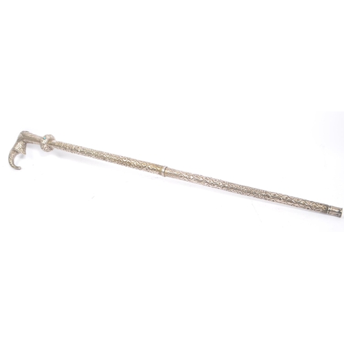 290 - A vintage 20th century Indian white metal swagger / walking stick cane in the form of an elephant. W... 