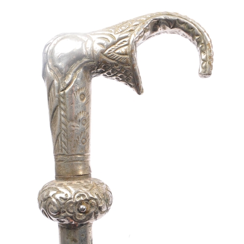 290 - A vintage 20th century Indian white metal swagger / walking stick cane in the form of an elephant. W... 