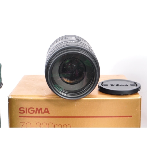 298 - A collection of 20th century 35mm film cameras and lenses. The collection to include a Chinon CP-X P... 