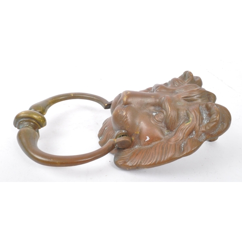 299 - A 19th Century Victorian bronze Lion Mask head pull door knocker. Measuring approximately 20cm x 12c... 