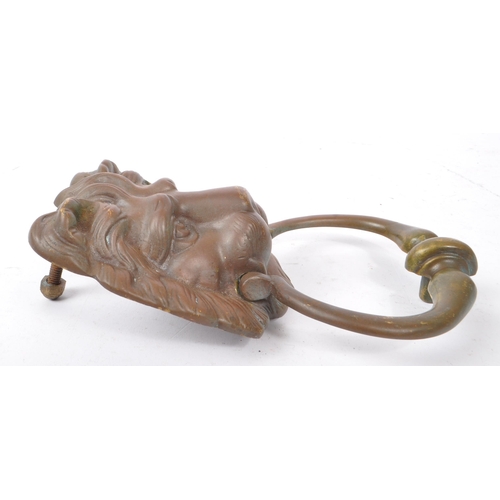 299 - A 19th Century Victorian bronze Lion Mask head pull door knocker. Measuring approximately 20cm x 12c... 