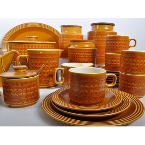 33 - A large dinner / tea service by Hornsea in Saffron pattern. The tea set / dinner service comprising ... 