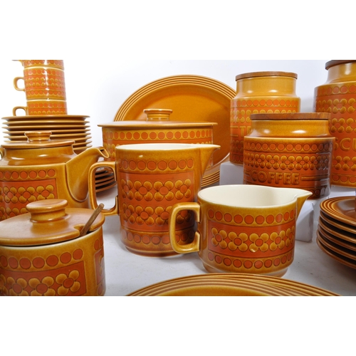 33 - A large dinner / tea service by Hornsea in Saffron pattern. The tea set / dinner service comprising ... 