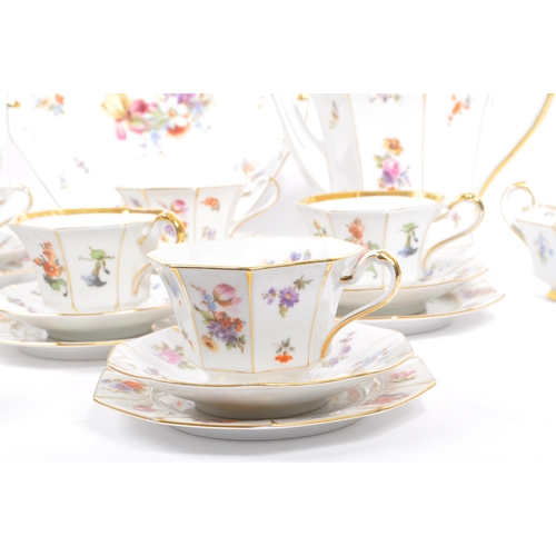 36 - A mid 20th century circa 1950s Bavaria tea / coffee service set. With multi coloured floral and frui... 