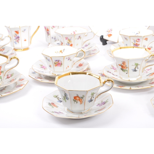 36 - A mid 20th century circa 1950s Bavaria tea / coffee service set. With multi coloured floral and frui... 