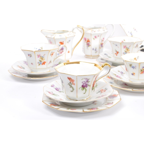 36 - A mid 20th century circa 1950s Bavaria tea / coffee service set. With multi coloured floral and frui... 