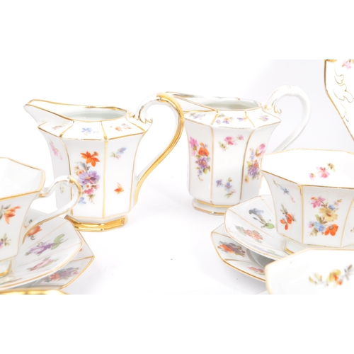 36 - A mid 20th century circa 1950s Bavaria tea / coffee service set. With multi coloured floral and frui... 