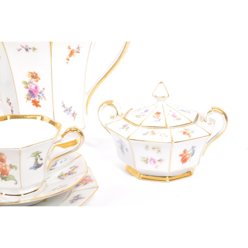 36 - A mid 20th century circa 1950s Bavaria tea / coffee service set. With multi coloured floral and frui... 