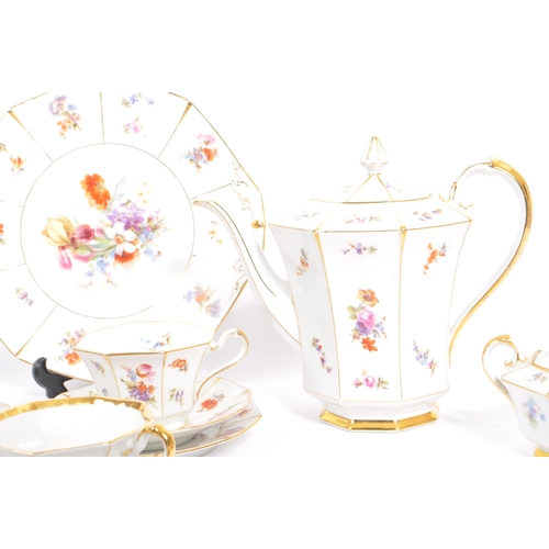 36 - A mid 20th century circa 1950s Bavaria tea / coffee service set. With multi coloured floral and frui... 